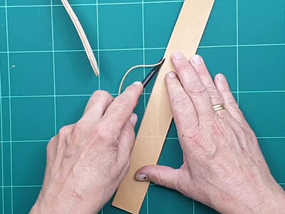 Step 3 Trim the edges with an edge beveler