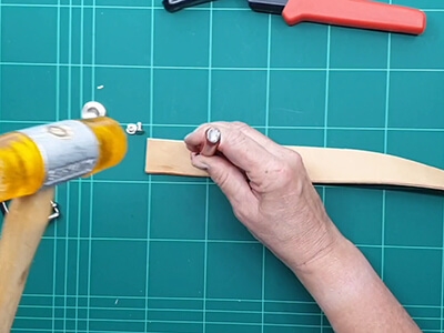 Step 6 Make a hole for the buckle with a grooving tool