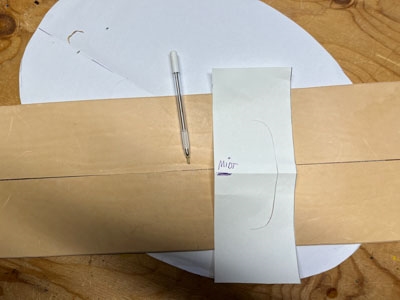 Step 10 Mark the middle on the leather pieces with a silver pen