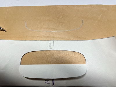 Step 11 Draw the handles with a silver pen on the leather
