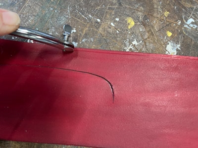 Step 16 Use the grooving iron on the leather edge