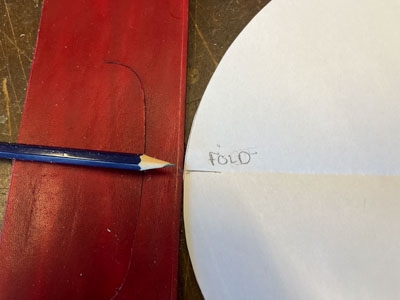 Step 17 Mark the center of the leather strip and the bottom