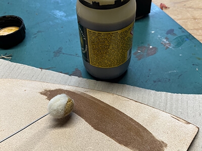 Step 3 Apply leather hardener with wool brush