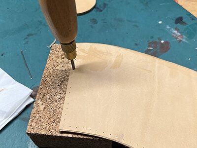 Step 4 Make holes with awl