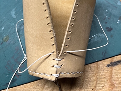 Step 9 Sew the sides of the dice cup together