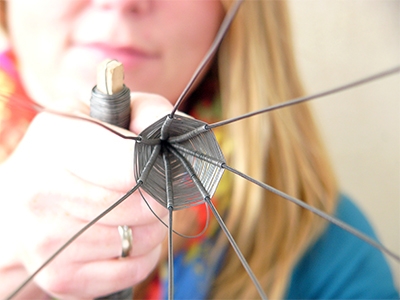 Step 3, This is what the weaving looks like inside the candle holder