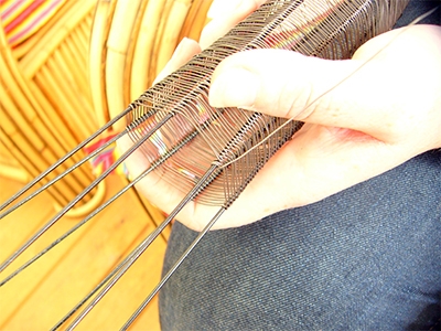Step 5, When desired height is reached, twist the wire twice and cut it