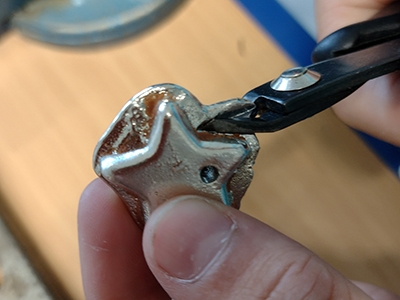 Step 10 Cut off excess tin with side cutters