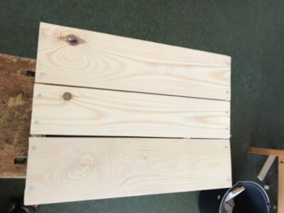 Step 11 Nail the bottom in place