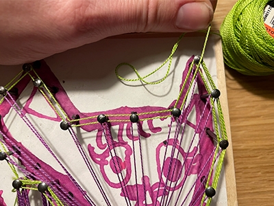 Step 10 Redraw the drawing with the same colored thread as in the first round
